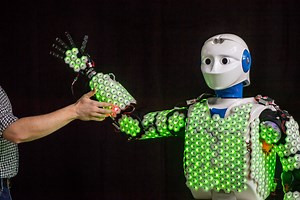 A highly performing and efficient e-skin for robotic applications