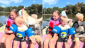 Huge fish throws itself into a boat slapping three terrified children across the face and sending one flying during family boat trip from hell