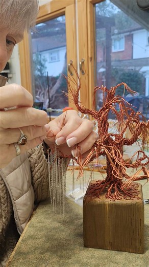 16K views · 428 reactions | FAQ3 Here I am plugging away at Chaining the woven willow... All be it slowly... You can understand why I use time Lapse when you see how slow it is in Real time. Today the age old question.... How did you get started with Trees? | Helene Barrott-Designs in Wire | Facebook