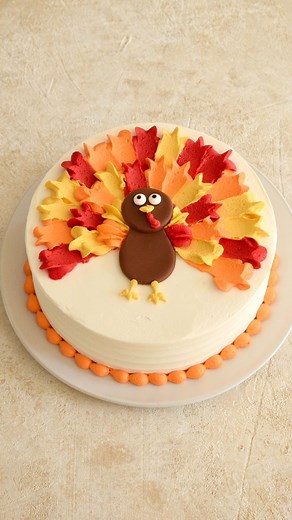 Dan Langan on Instagram: "Here’s an easy buttercream turkey cake using simple piping techniques. Would you give this a try? #thanksgiving #buttercream #piping #cakedecorating #baking #turkey"