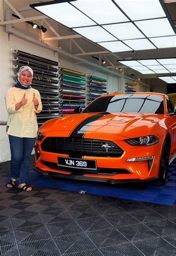 Ford Mustang in Candy Metallic Neon Orange: A Stunning Wrap