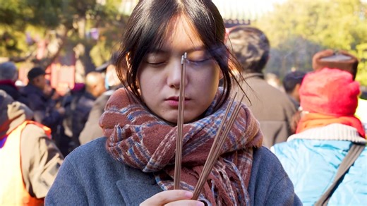 Chinese welcome Lunar New Year visiting Lama temple in Beijing