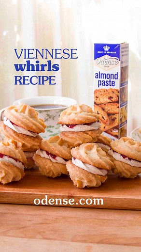 Our Viennese Whirls are made with decadent jam and buttery sandwich cookies, with a velvety texture from Odense Almond Paste. Get recipe: odense.com/odense-recipes/viennese-whirls/ #HolidayBaking #ChristmasCookies #AlmondPaste #CookieRecipe #HomeBaking | Odense Almond Paste and Marzipan