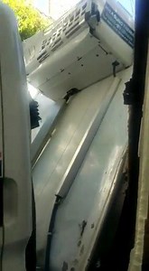 Distribution Truck crashed into Sendall Tunnel's height restriction bar | Grenadian Drivers