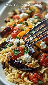 Orzo cooked until tender. Toss with oregano, smoked paprika, lemon zest. Roast eggplant, zucchini, peppers, onions at 425°F for 22–25 minutes. Finish with fresh herbs and creamy feta—bright, smoky, and irresistibly fresh. Ingredients ➤ 1 ½ cups dry orzo ➤ 1 small eggplant, diced ➤ 1 medium zucchini, sliced ➤ 1 red bell pepper, chopped ➤ 1 red onion, cut into wedges ➤ 1 cup cherry tomatoes, halved ➤ 3 tbsp extra-virgin olive oil (plus more for drizzling) ➤ 1 tsp dried oregano FULLL Recipe in Firs
