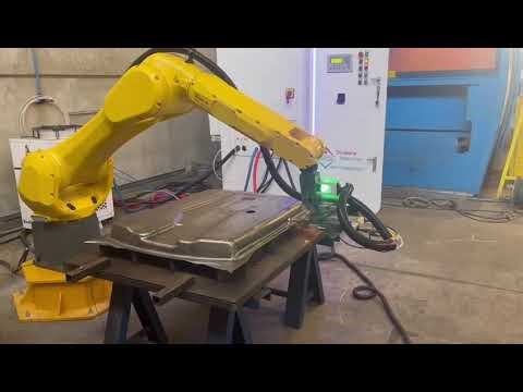 Robotic laser cutting process for stamped components