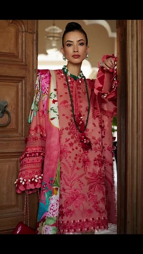 A sumptuous hue of salmon is artfully illustrated with detailed embroidery depicting flora in bloom in tonal shades of scarlet and peach creating for a mesmerising composition in ’Arna’. Accompanied by our plush silk dupatta beautifully adorned with dramatic florals and folioles in vibrant hues, this design defines true flamboyant elegance and serves as the perfect look to wear to a garden affair | Tara Dress Chemistry