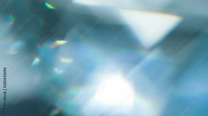 Sparkling Diamond Highlights. Loop. The light passes through the facets of a slowly rotating diamond and creates repetitive sparkling highlights and rainbow colors