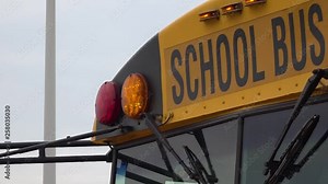 Bus stopped and lights are flashing