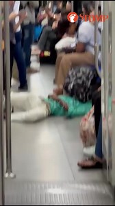 Man lies on MRT train floor with bag covering his face: Drunk or sleeping? #stomp #mrt #singapore