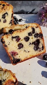 This soft, moist blueberry muffin bread has all the things you love about your favorite bakery style blueberry muffins, but in one easy loaf. It's fluffy, buttery, loaded with blueberries, and topped with a delicious cinnamon sugar crumble topping. The blueberry muffin batter only takes minutes to mix together before baking. This blueberry muffin bread is made with greek yogurt, so it has some added protein and nutrition, making it the perfect start to your day. Comment recipe for the recipe to