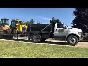 F750 dump truck pulling 20 ton trailer