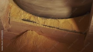 Working old water powered grist mill made of stones and wood, 4k