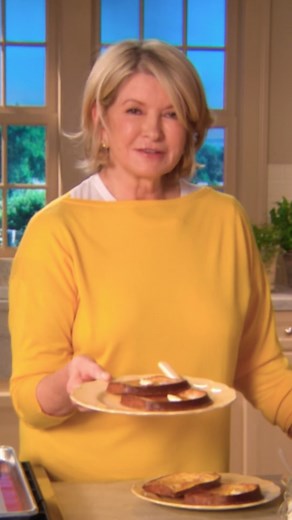 This recipe, a reworked version of Martha's famed French toast recipe, cooks 12 slices at once in the oven, making it a breeze to feed a crowd. Flavored with orange juice and zest, and a splash of orange-flavored liqueur, it's just what your morning needs. Get the recipe: bit.ly/3vKzrY9 | Martha Stewart