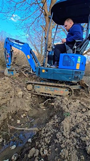 $1999 Mini Excavator Crosses The Water Channel