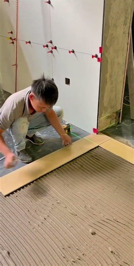 Installing wood flooring on top of granite flooring to create a layered effect in the house #shorts