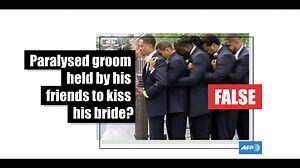 No, this husband-to-be is not paralysed — his groomsmen are in a traditional fraternity pose