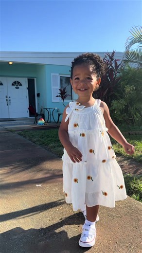 Fashion Friday is here and Ms. Tally is owning her closet! 💃✨ Today she’s serving looks in a stunning white dress with red floral details, perfectly paired with her classic white Converse kicks. She’s not just wearing the outfit; she’s showing it off with all the confidence in the world! ❤️👟 #FashionFriday #MsTally #ToddlerStyle #OOTD