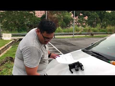 Demonstration on Fitting RFID Stickers at the Fitment Centre