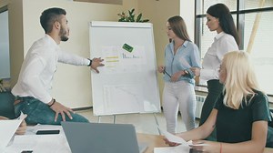 Work team analyzing graphs in office - Free Stock Video