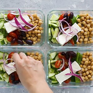 Greek Chickpea Salad, made with chickpeas, cucumbers, tomatoes, bell peppers, olives and Feta is perfect to make ahead, for lunch for the week! | Skinnytaste