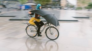 This umbrella will keep you dry while riding your bike
