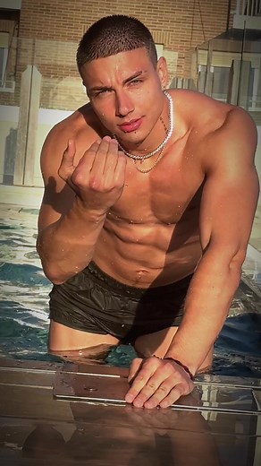 Young Man Enjoying Poolside Relaxation