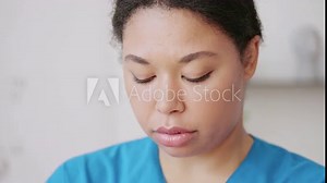 Closeup of female doctor examining patient's foot, rehabilitation center worker
