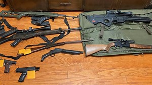 7 arrested after authorities find drugs, guns and explosive devices in Cherokee County home