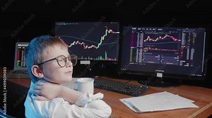 A rear view of a body sitting at a computer and looking at an online stock market chart showing bitcoin currencies. The boy has a sore neck. In real time. Cryptocurrency. Investors