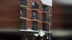 The mans' clumsy rooftop escape came to an abrupt end