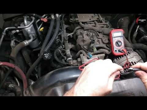 Back probe an electrical connector using a digital multi meter and a t-pin for expert diag. work