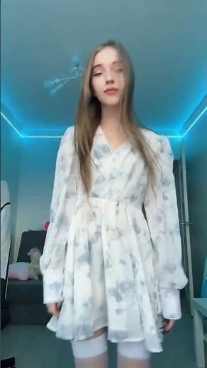 Girl in white stockings dancing