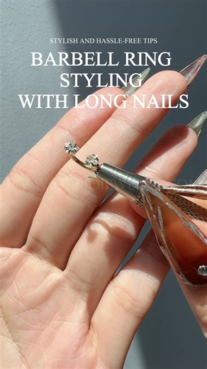 Long nails? No problem ✨ Here’s how to style your barbell ring without the struggle. The grabber tool gives you total control — so you can shine, not stress   Fits conch, helix, and rook  Two sparkle stars = double glow  Made from titanium for comfy, hypoallergenic wear | Oumo jewelry | Facebook