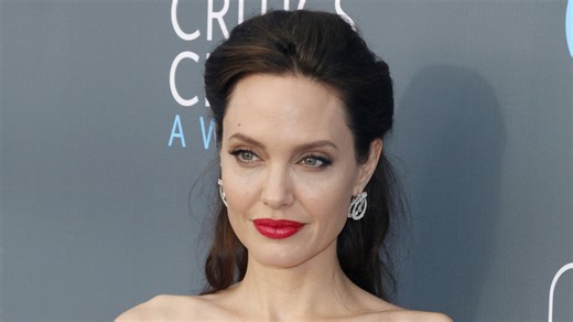 Details about Angelina Jolie's unique wedding dress