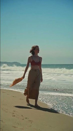 Woman walking on beach
