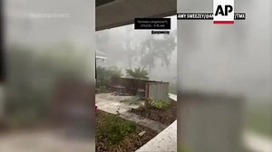 Possible tornado touches down in Florida uprooting trees and scattering debris