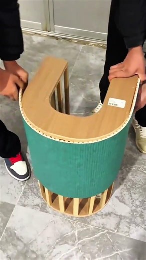 Wrapping flexible green panel around creative wooden furniture
