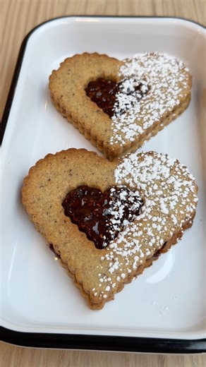 Hazelnut Raspberry Linzer Cookies made from scratch. #somedaysbakery