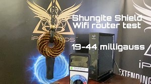 Micro iTorus Shungite Shield Wifi Router EMF test Reduces radiation by almost 100% Note how the body absorbs Almost 100% of the EMF From the wifi router Note how the thick book absorbs None of the radiation. For more information visit our previous Post or go to iPyramids.net Link in the bio as well #5Gprotection #meditation #healthandwellness #biohacking #lifehack #chakraactivation #shungite | IPyramids