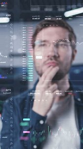 Male investment specialist analyzes cryptocurrency charts in modern office. 3D render of real-time stocks on glass wall. Futuristic AI VFX animation. Vertical shot