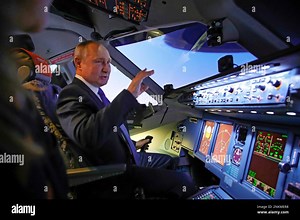 Russian President Vladimir Putin sits in the cockpit of an airplane simulator as he visits Aeroflot Aviation School outside Moscow, Russia, Saturday, March 5, 2022. (Sputnik, Kremlin Pool Photo via AP Stock Photo - Alamy