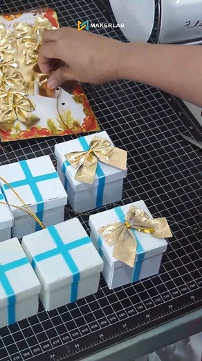 6.6K views · 34 reactions | 3D-printed gift box ornament using Creality K2 Combo. Perfect for your tree… or maybe put some candies inside! bit.ly/48NXE1k #Makerlab #EveryMakersChoice #CrealityK2 | Makerlab Electronics | Facebook