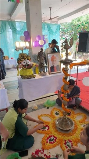 Wide shot of decorated stage & lamp setup