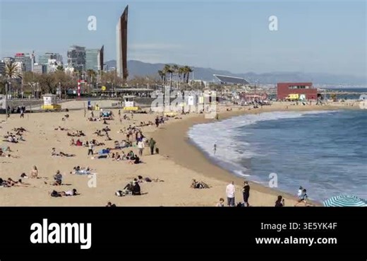 crowds on barcelona beach in la barceloneta neighborhood in spring Stock Video Footage - Alamy