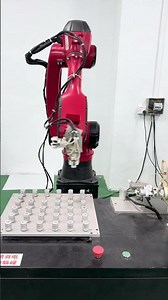 Robots work in conjunction with lathes for loading and unloading.#Industrial robots
