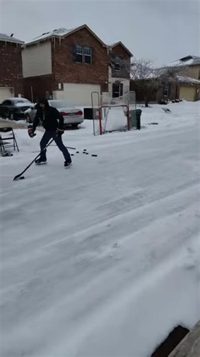 Ice skating on the street. Texas winter storm 2021. North of Leander, Texas.