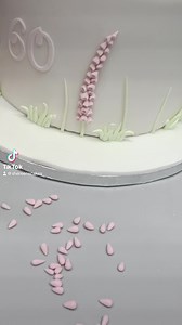 Making foxgloves on a cake. Roll littler teardrop shapes in various sizes. I used Saracino modelling paste for this. When you start building the foxglove, start with larger pieces first and work your way up to finish off with smaller pieces at the top, the rolling of the pieces takes time but definitely worth it for the finished result. #cakemaker #birthday #birthdaycakes #cakeart #cakesofinstagram #cakedesign #cakedecorating #cakedecorator #foxgloves #sugarflowers #prettycakes | Shereen's Cakes