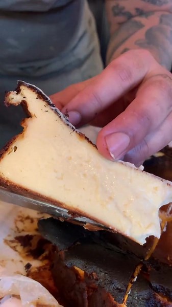 Our Basque cheesecake is cooked at a high temperature giving it its dark brown / burnt crust but a soft and creamy filling that goes well with coffee! #burntbasquecheesecake #cheesecake #coffee #lunch