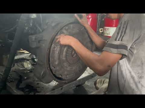 Car repair, replacing a cracked engine block.